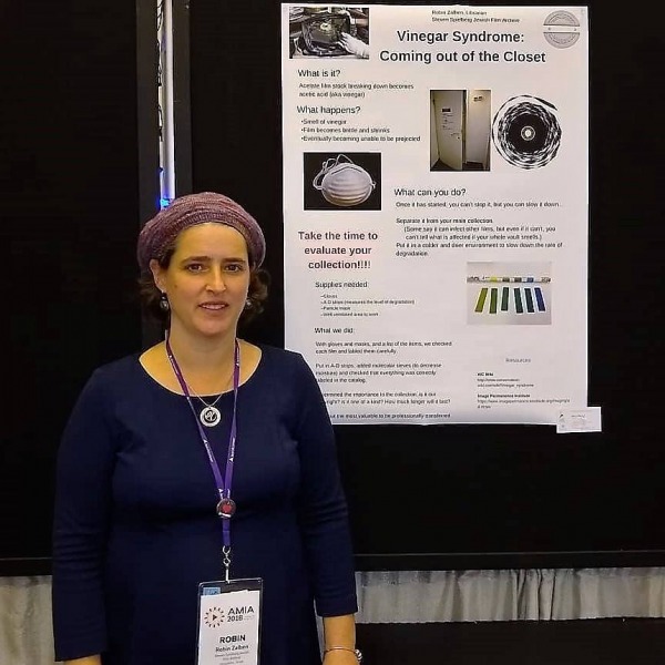 Zalben presenting poster at conference
